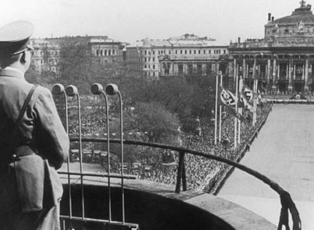 德国吞并奥地利是在什么样的背景下发生的 宣布合并的时间是在哪一年